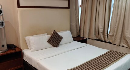 Hotel Suvarnam Pride Room Type - Deluxe Room
