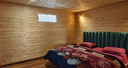 The Heimat Resort | River-view Tents Room Type - Garden view family wooden suite