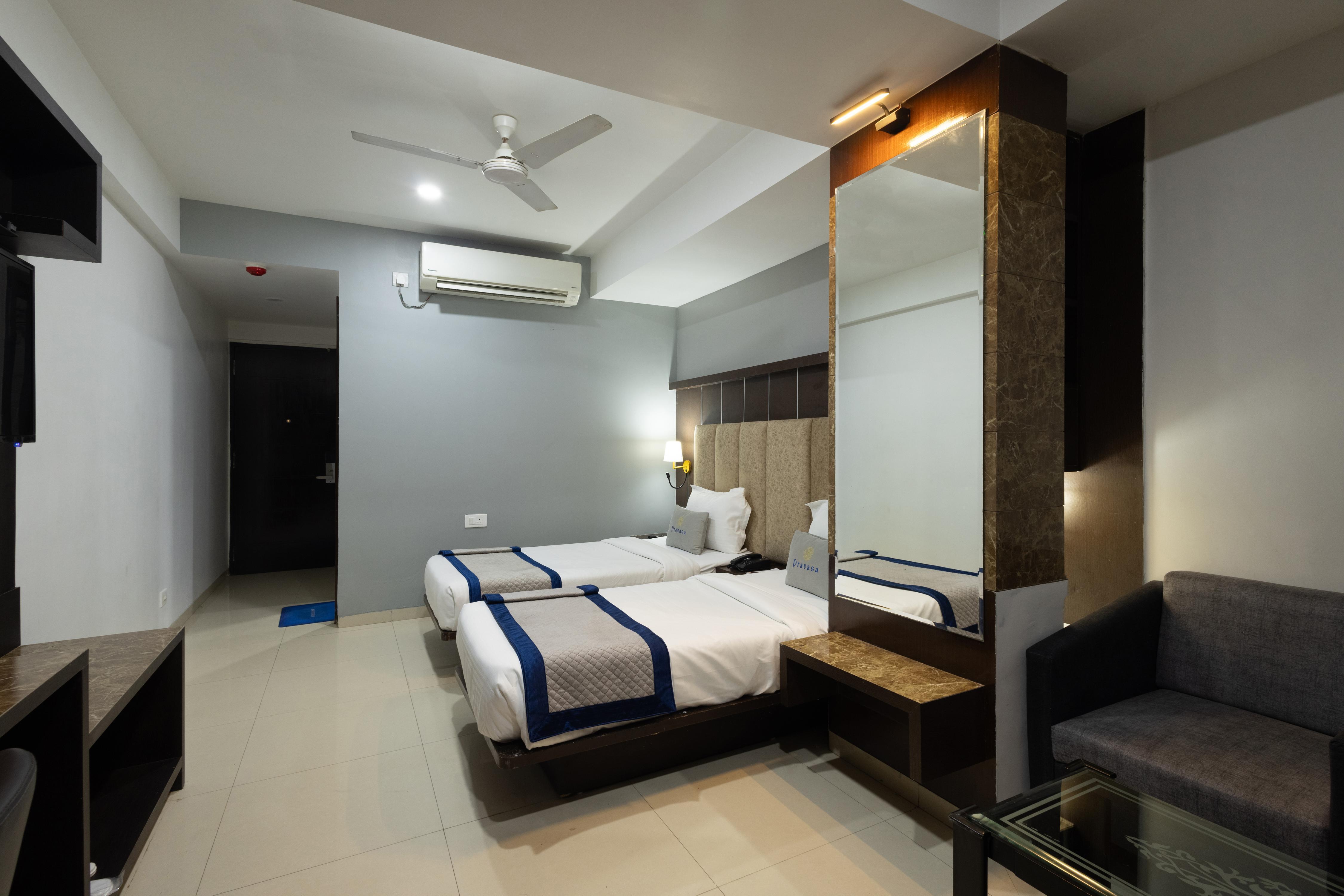 Pravasa Hotel by Sapphire - Tap to explore photos