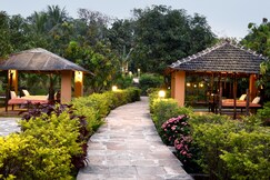 SaffronStays Mango Huts by the river