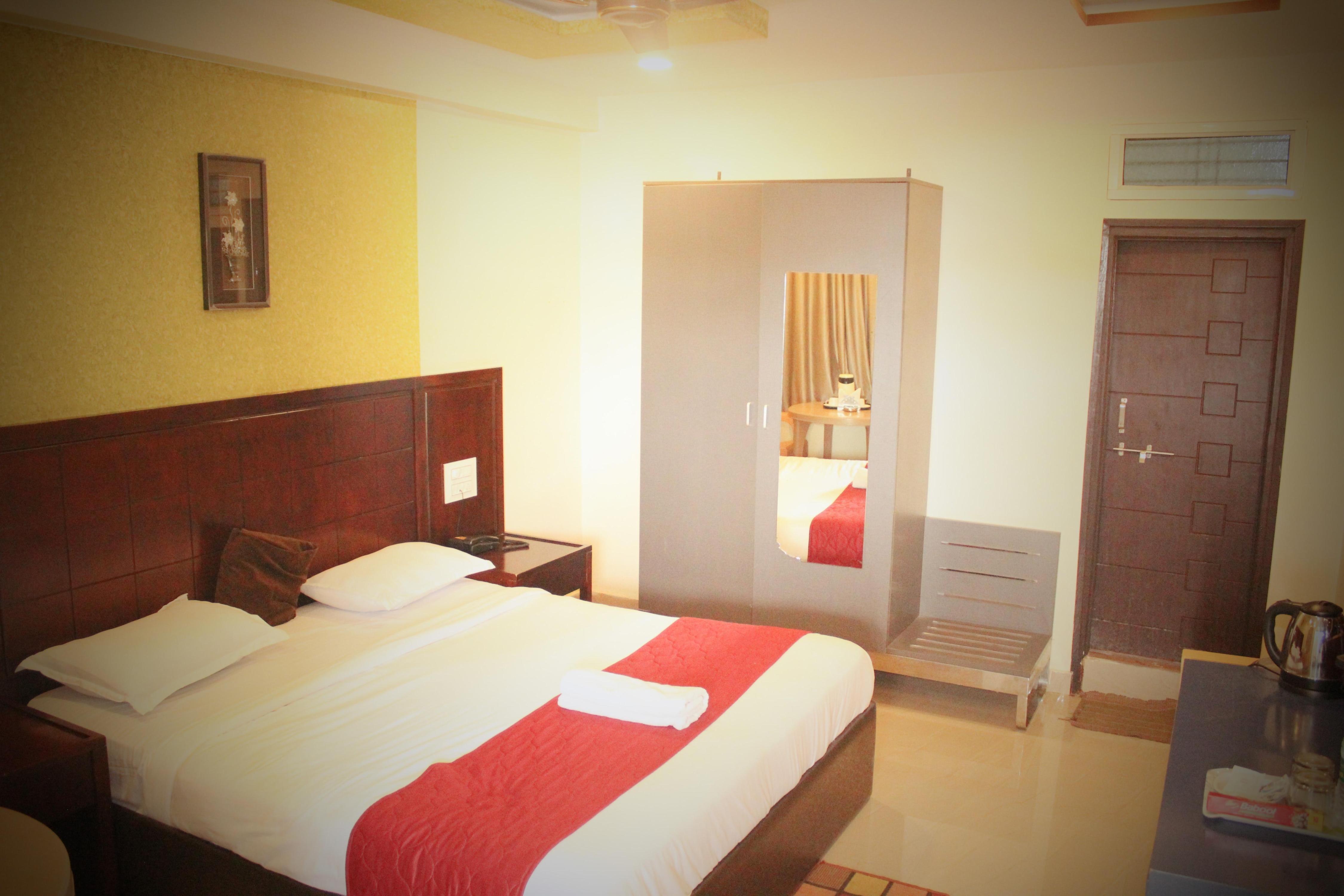 PAVAN MANSION Room Type - DELUXE NON AC