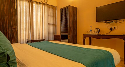 Hotel Rishikesh Grand by Kool-stays Room Type - Deluxe Room with Pool View Balcony Hotel Rishikesh Grand by Kool-stays Room Type - Deluxe Room with Pool View Balcony