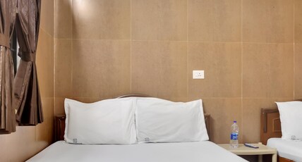 Vasavi Cottage Room Type - Deluxe Triple Bedroom AC