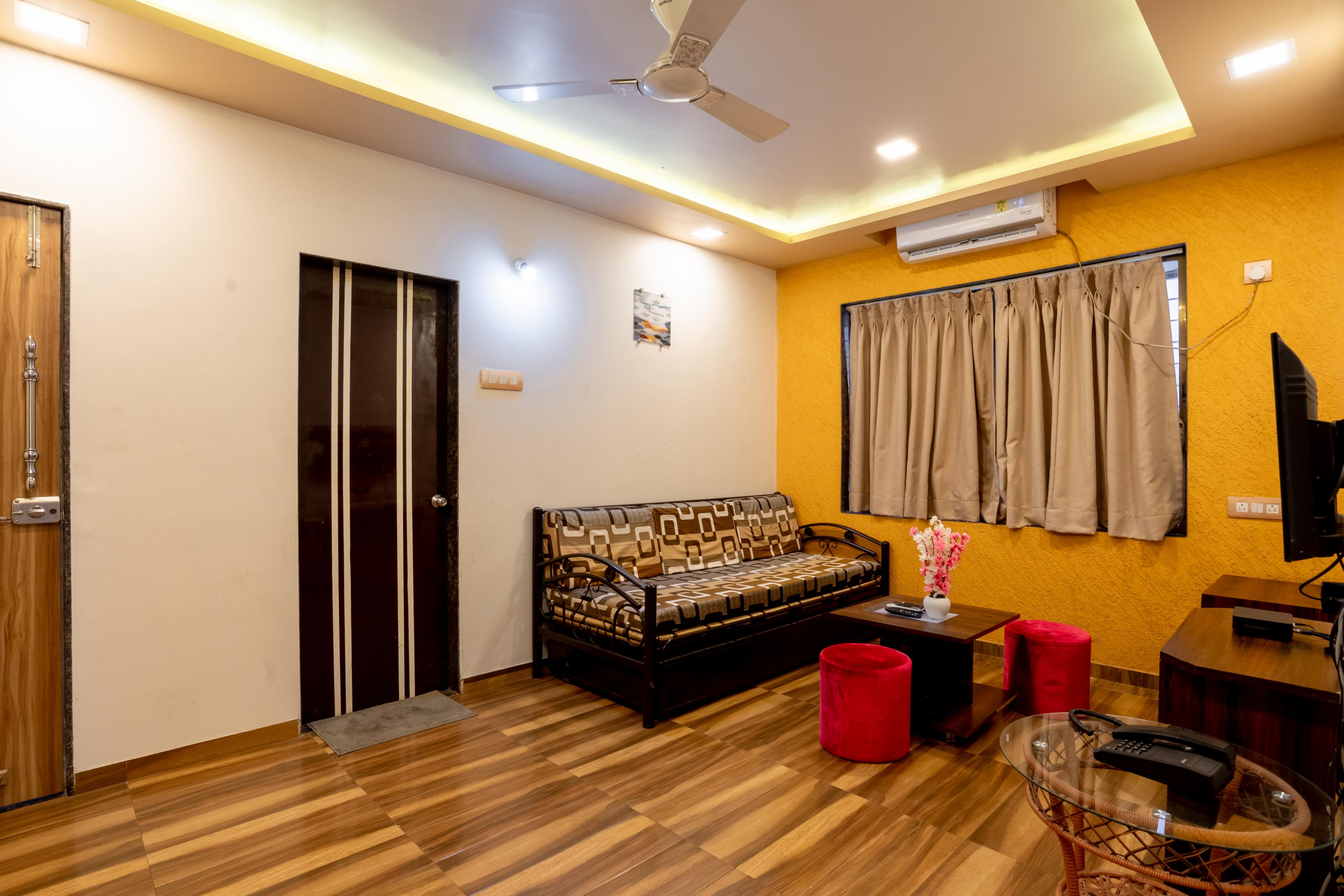 Pooja Villa Suites | Rooms & Pool - Tap to explore photos