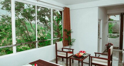 Munnar Summer Castle Room Type - Deluxe Balcony View Non AC Munnar Summer Castle Room Type - Deluxe Balcony View Non AC