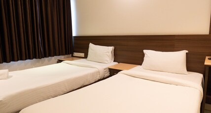 Hotel Karuna Residency Room Type - Deluxe Twin-Bed Room
