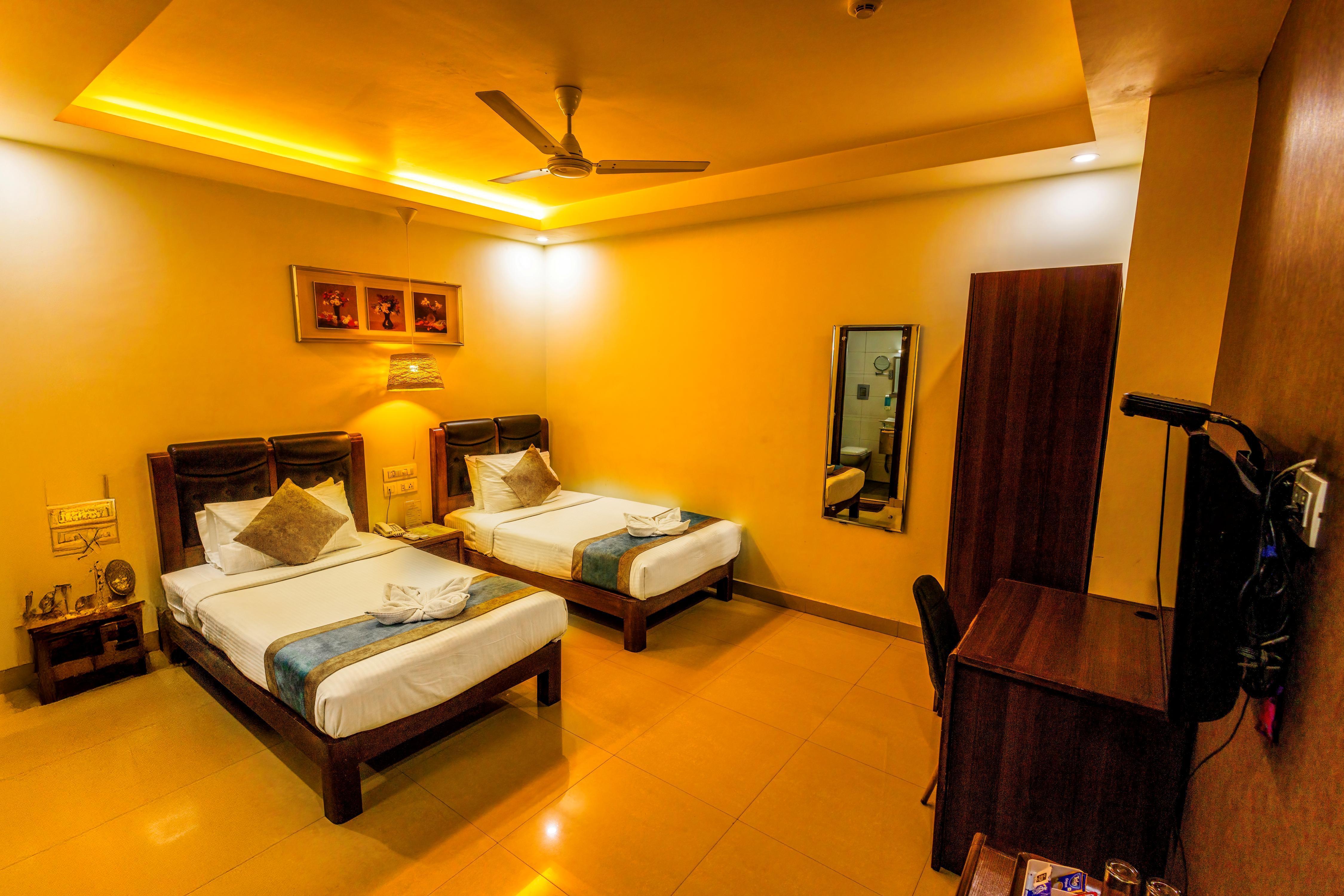 New Satyam Stay Comfort - Tap to explore photos