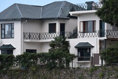 The Dew Drops Villa | Rooms & Kitchen