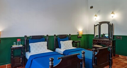 SaffronStays Calamondinn Bungalow Room Type - Luxury Room