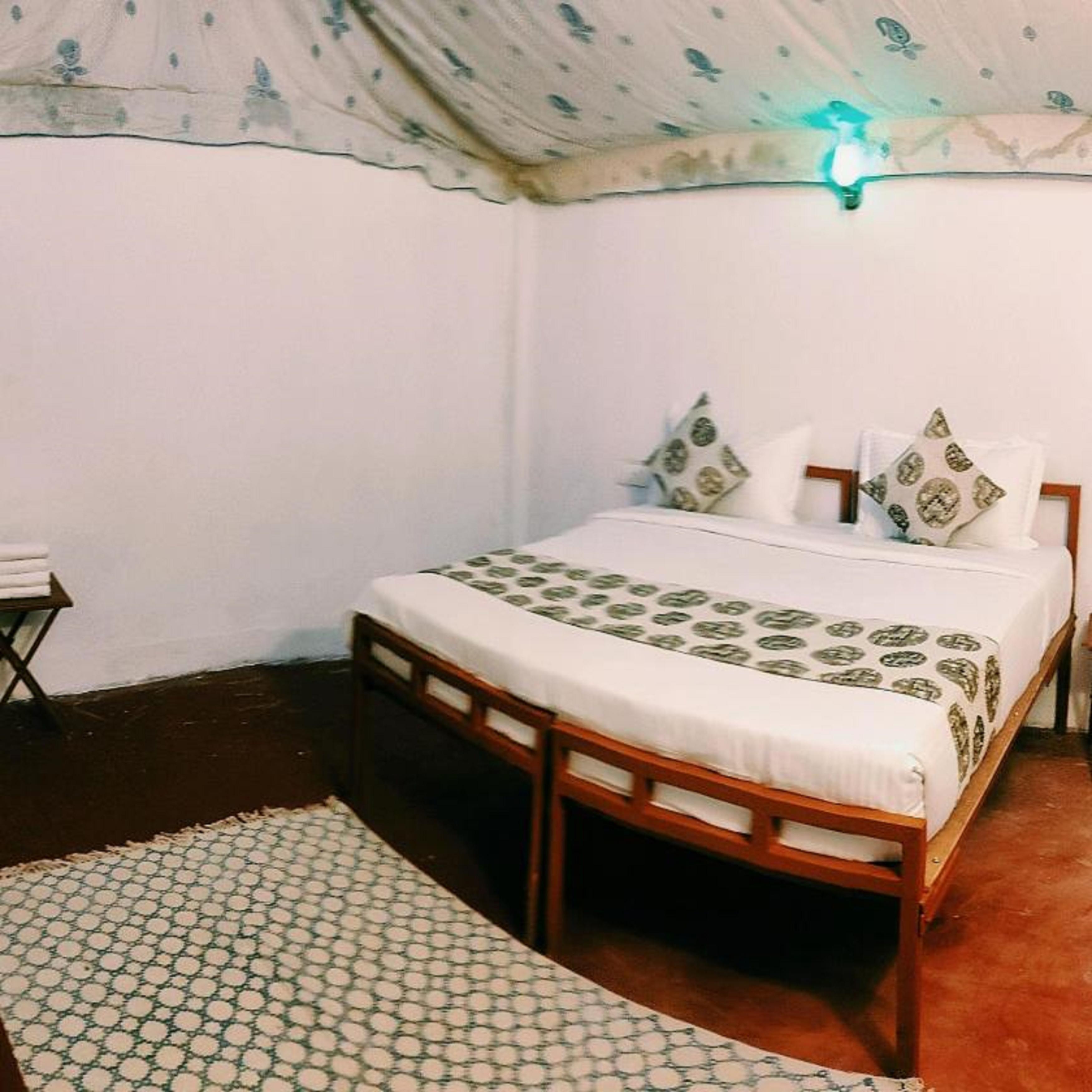 The Junagarh Lodge | Rooms & Pool - Tap to explore photos