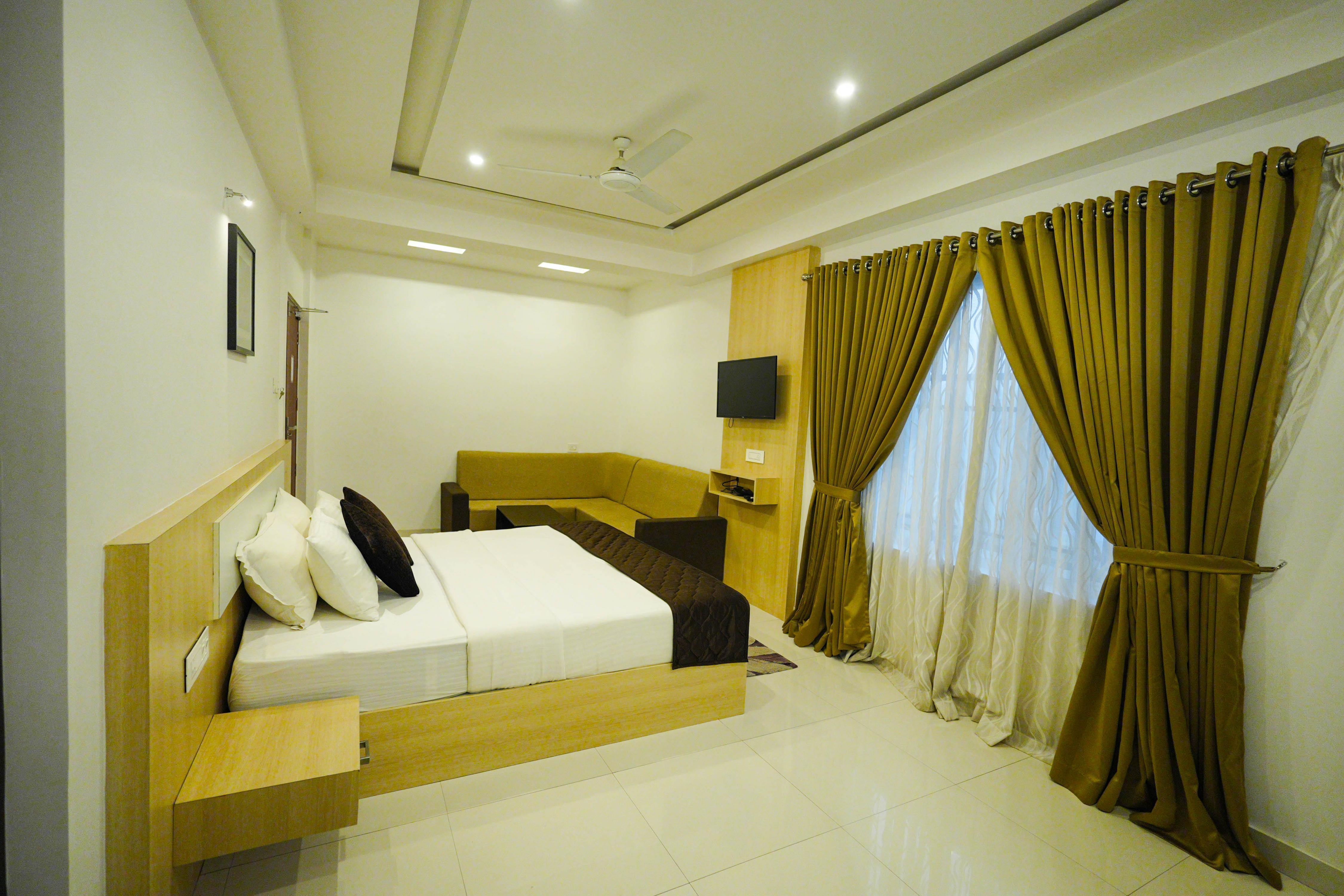 ATHIRAPPILLY RAINLAND RESORT Room Type - DELUXE QUEEN ROOM