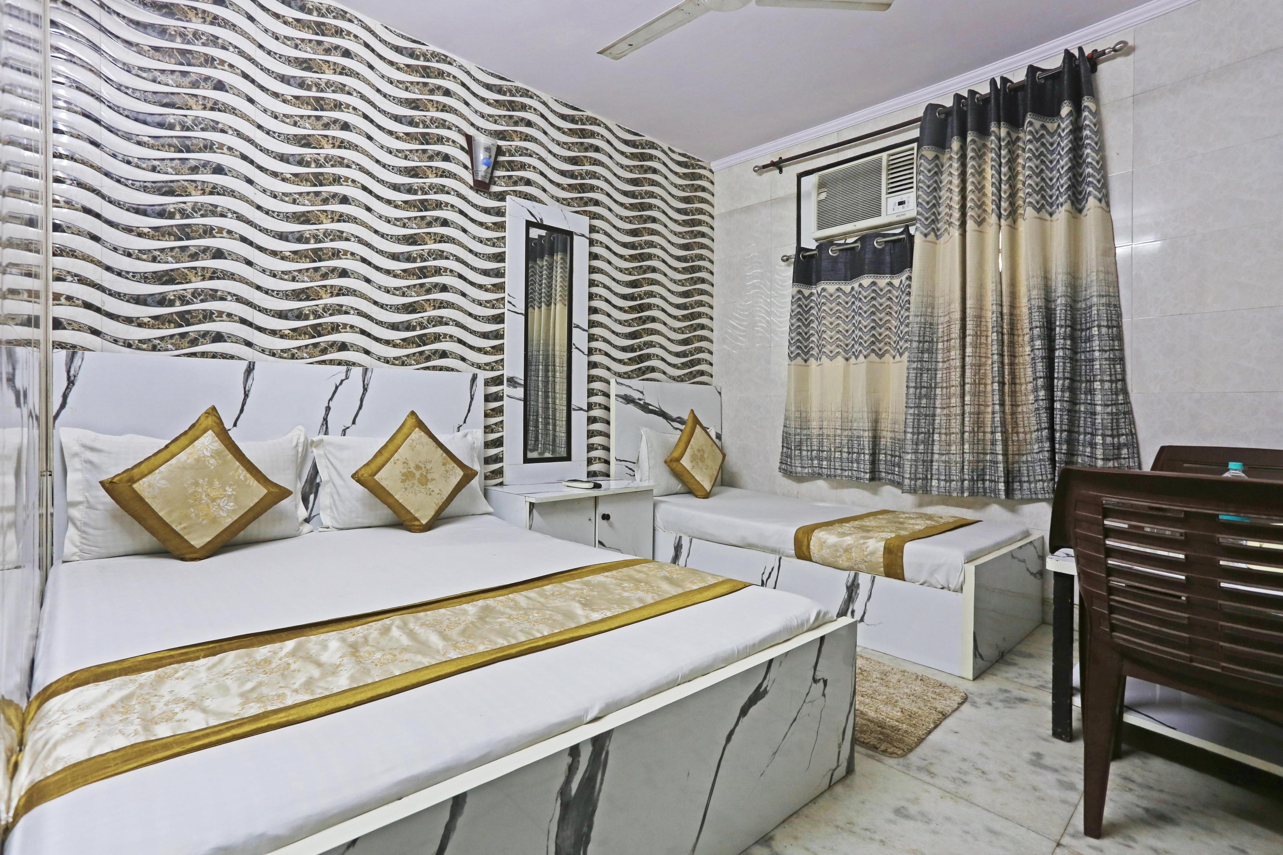 Hotel New Rajdhani Inn Room Type - Family Room With Triple Bed Hotel New Rajdhani Inn Room Type - Family Room With Triple Bed