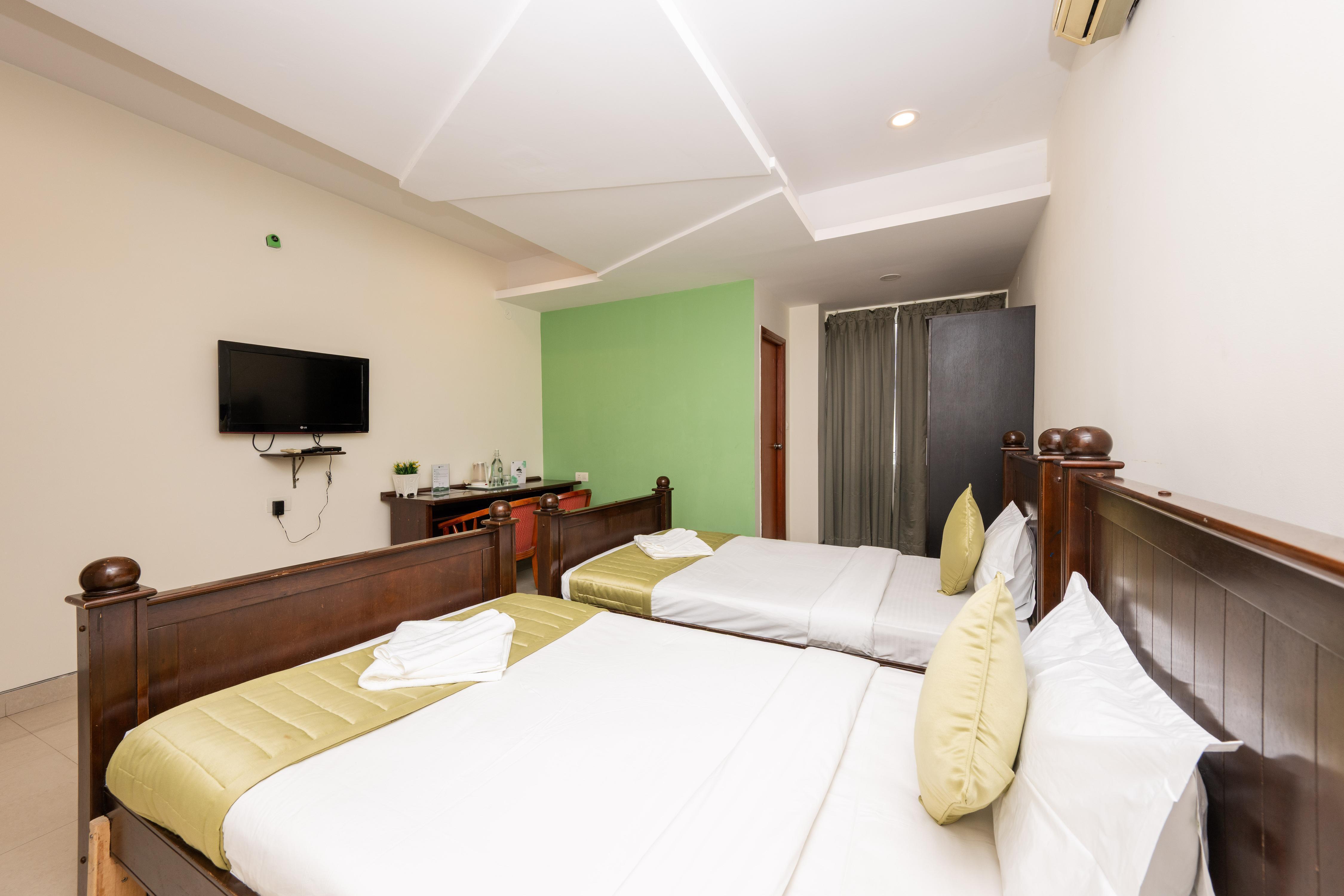 Earth Hotels Domlur - Tap to explore photos