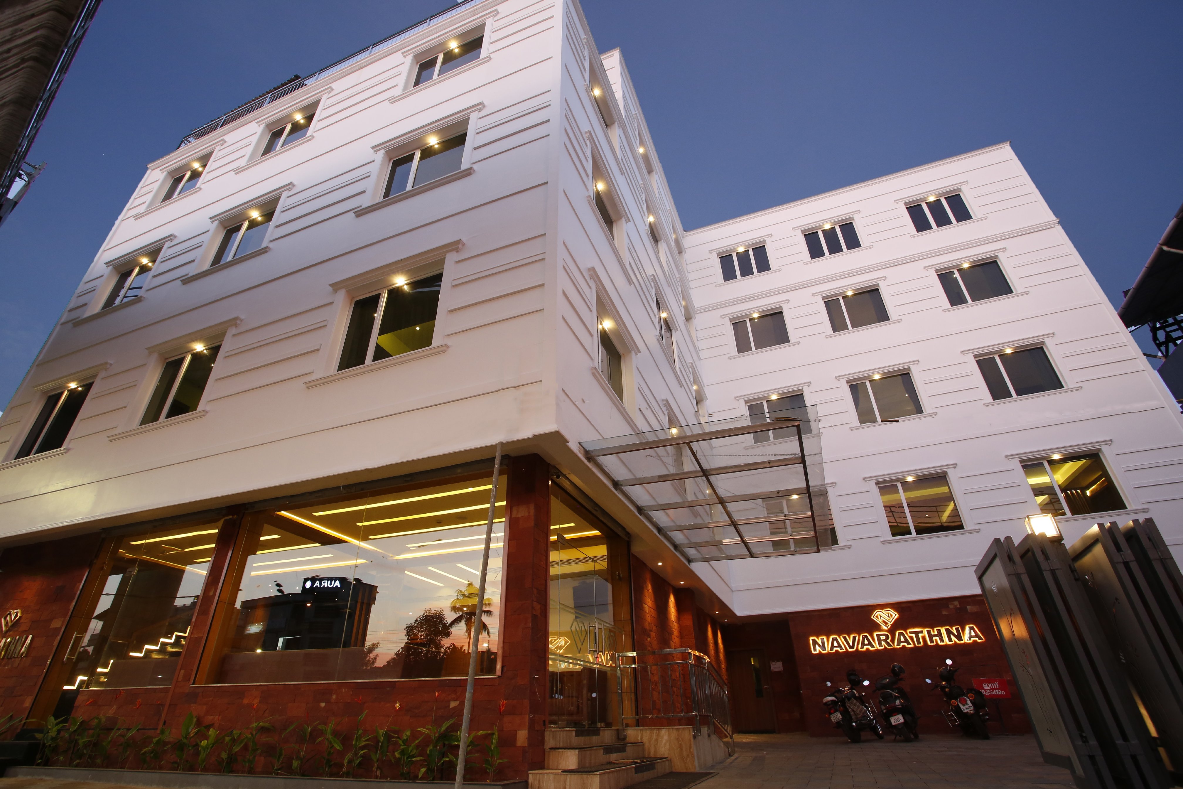 Hotel Navarathna - Tap to explore photos