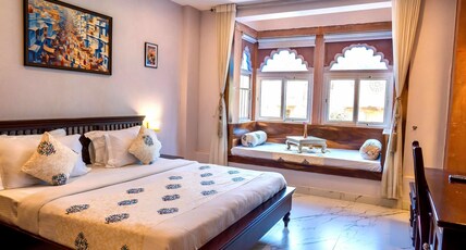Kankariya Heritage Room Type - Superior Room with Jharokha, street view, King Bed ( 1st floor ) Kankariya Heritage Room Type - Superior Room with Jharokha, street view, King Bed ( 1st floor )