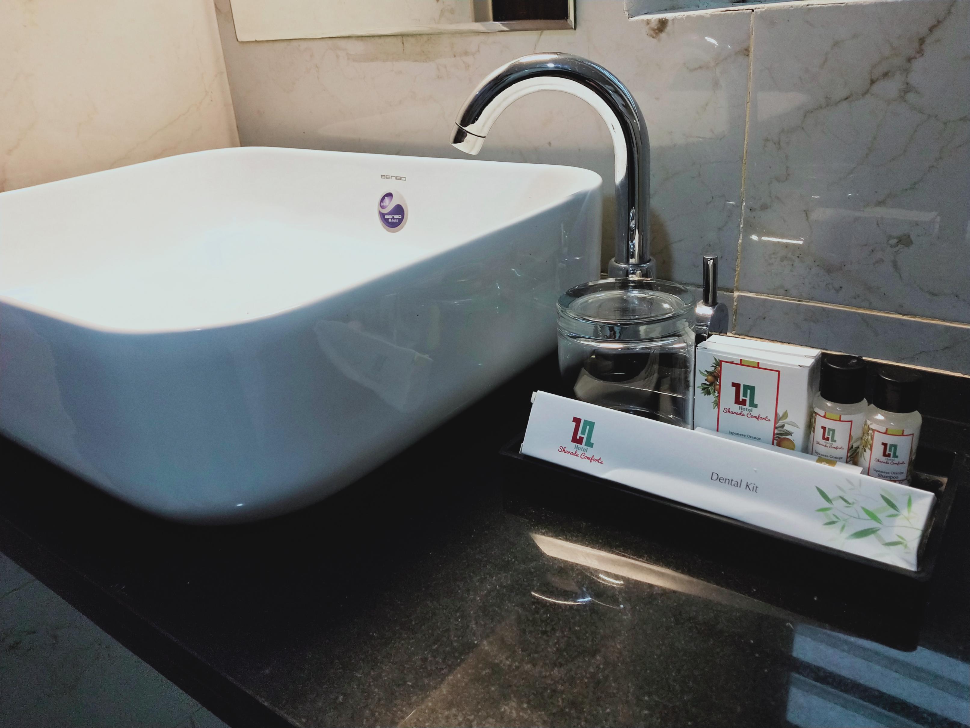 Hotel Sharada Comforts - Tap to explore photos