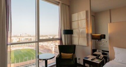 Centro Al Manhal by Rotana Room Type - Stadium View Centro Room - Queen Bed