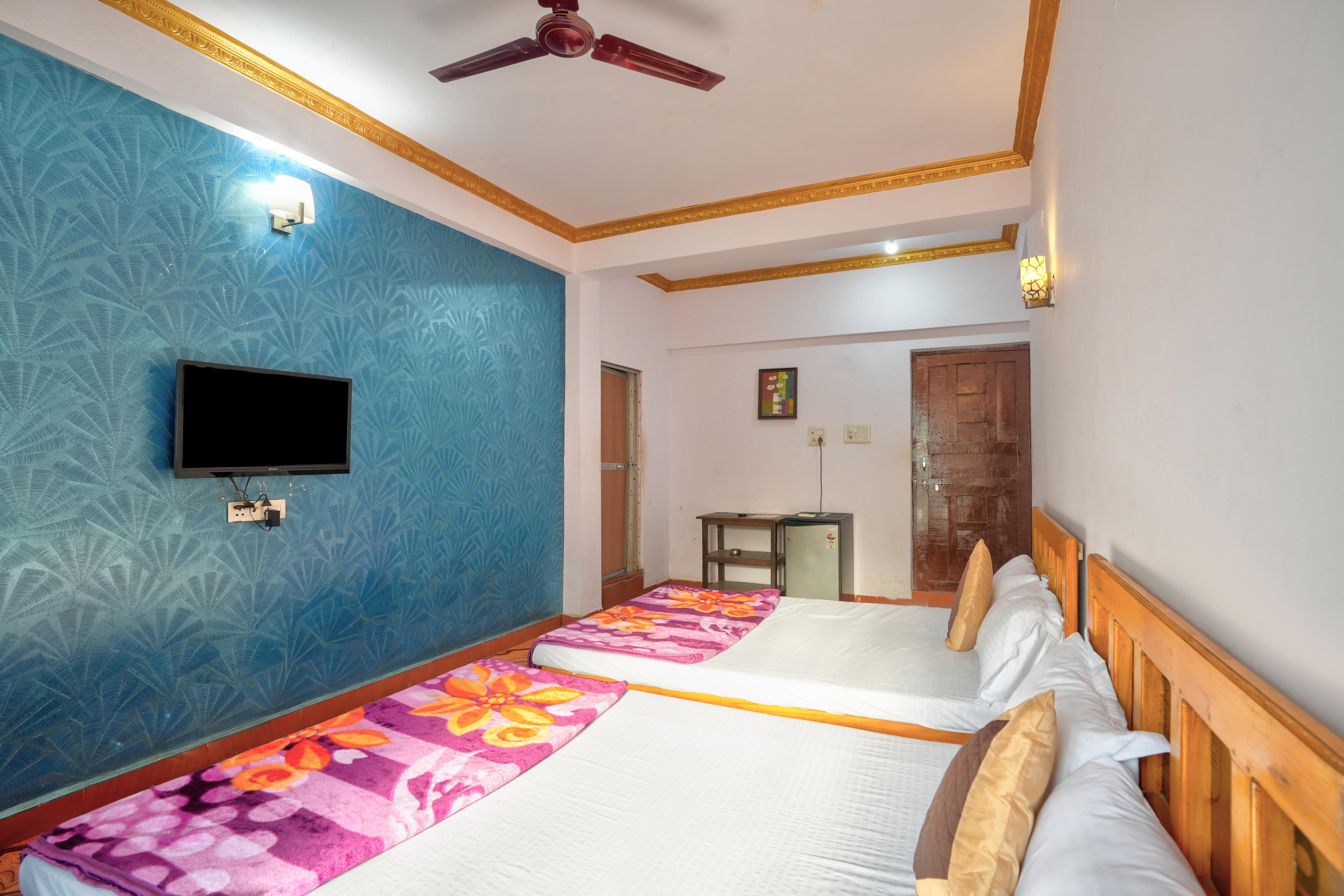 Om Sai Guest House - Tap to explore photos