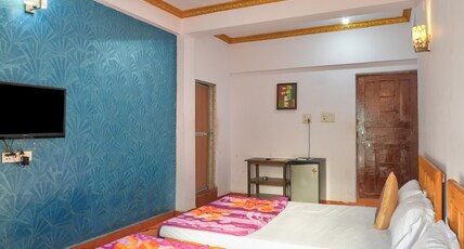 Om Sai Guest House Room Type - Deluxe Family ROOM