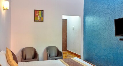 Om Sai Guest House Room Type - Deluxe single Room