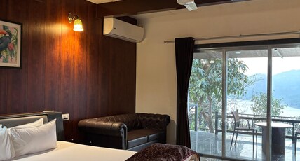 The Green Gate Resort Room Type - Prajot Wing II Super Deluxe with Balcony (450 Meters from Reception) The Green Gate Resort Room Type - Prajot Wing II Super Deluxe with Balcony (450 Meters from Reception)