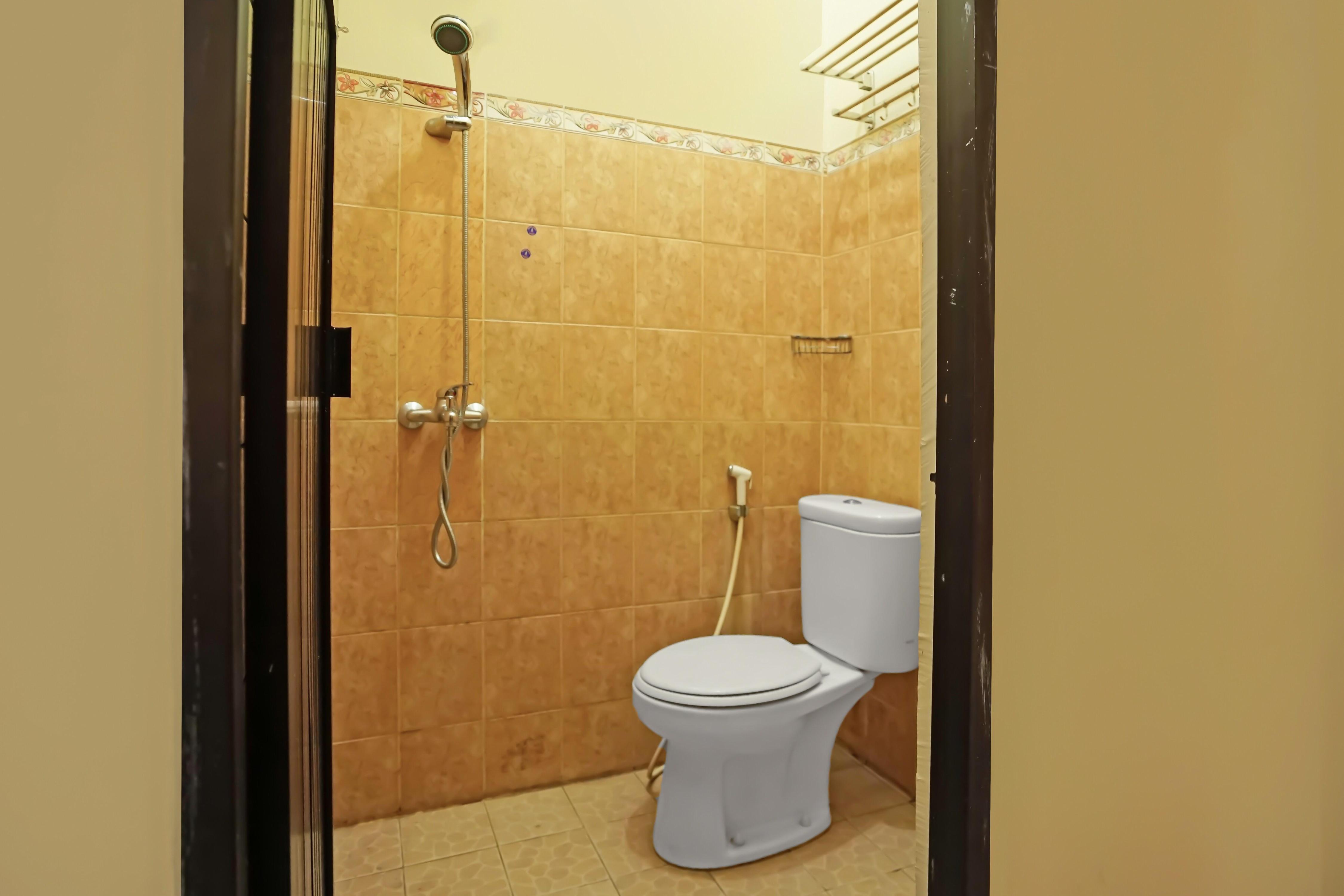 Hotel O Wisma Empat Lima Syariah - Tap to explore photos