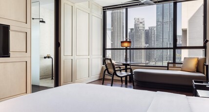 The RuMa Hotel and Residences Room Type - Grand Studio Twin Tower View