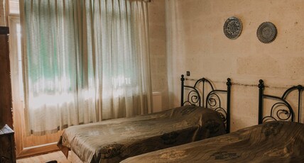 HOLIDAY CAVE HOTEL Room Type - Double Arch stone Room HOLIDAY CAVE HOTEL Room Type - Double Arch stone Room