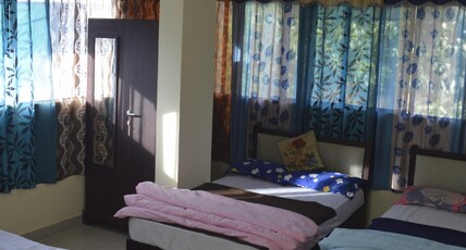 Green Homes Room Type - Deluxe Triple Room 203 Neem Castle