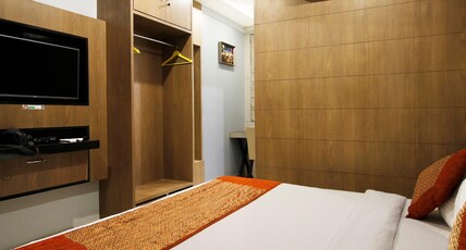 Galaxy Inn | 5 Min From Nemcare Hospital Room Type - Deluxe Room With City View Galaxy Inn | 5 Min From Nemcare Hospital Room Type - Deluxe Room With City View