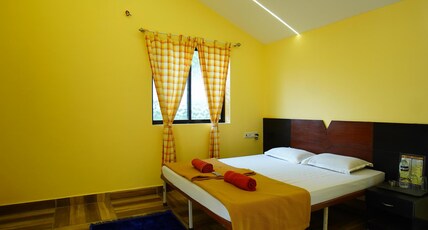 Kamal Homes | Rooms & Restaurant Room Type - Deluxe Ac Room With Balcony Pool View