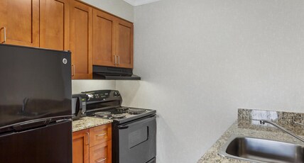 Best Western Plus Rose City Suites Room Type - Suite-1 King Bed, Non-Smoking, Upper Floor, High Speed Internet Access, Sofabed, Microwave And Refri