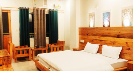 Hill Hoppers | Private Rooms & Dorms Room Type - Deluxe Room with Balcony