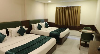 GreenOtel Rooms,Hazira Surat Room Type - Family Room