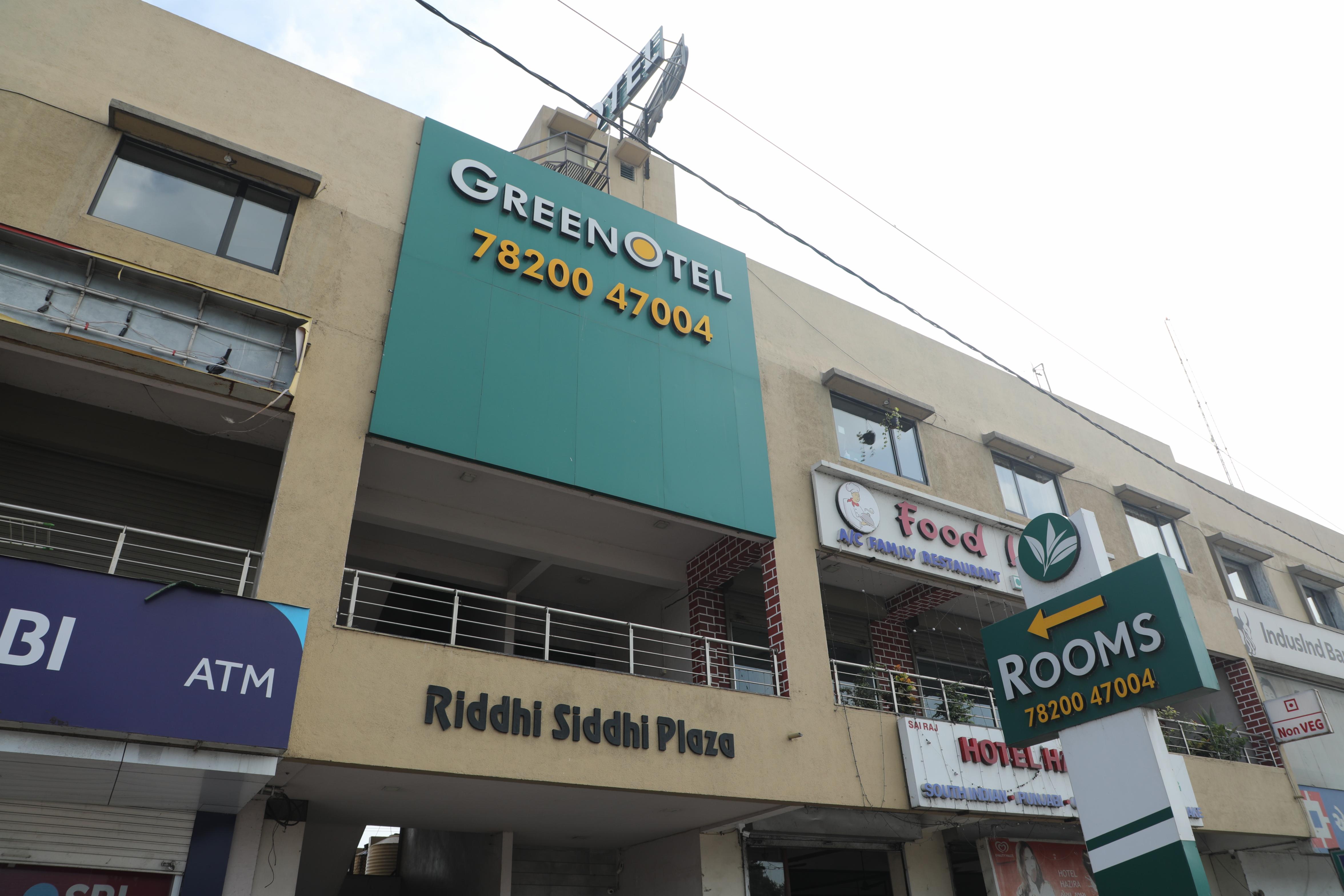 GreenOtel Rooms,Hazira Surat - Tap to explore photos