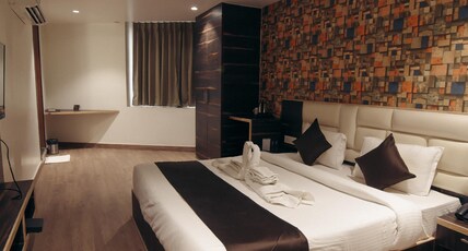 The Crims Hotel Pratap Nagar Room Type - Super Deluxe room