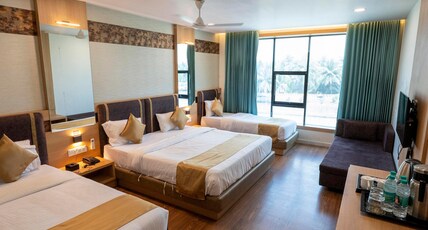 The Grand Astoria Somnath By Shivalaya Darshanam Room Type - ROYAL FAMILY (4 BED) ORCHID VIEW The Grand Astoria Somnath By Shivalaya Darshanam Room Type - ROYAL FAMILY (4 BED) ORCHID VIEW