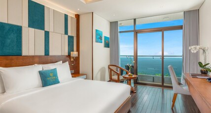 Mandila Beach Hotel Danang Room Type - Oceanfront Deluxe King Room with Balcony Mandila Beach Hotel Danang Room Type - Oceanfront Deluxe King Room with Balcony