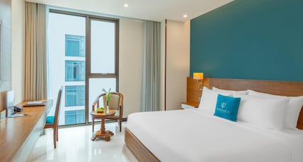 Mandila Beach Hotel Danang Room Type - Deluxe King Room with Partial Ocean View Mandila Beach Hotel Danang Room Type - Deluxe King Room with Partial Ocean View