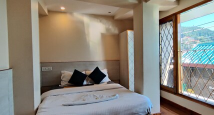 Hotel Midtown Malhotras Room Type - Deluxe Room