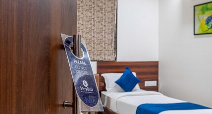 Hotel StayBird - Nest, Kharadi Room Type - Premium Twin Sharing Room (2X)