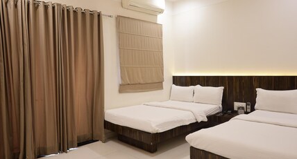 Hotel President Banquet & Lawn Room Type - Deluxe Quadrable Room With Balcony Hotel President Banquet & Lawn Room Type - Deluxe Quadrable Room With Balcony