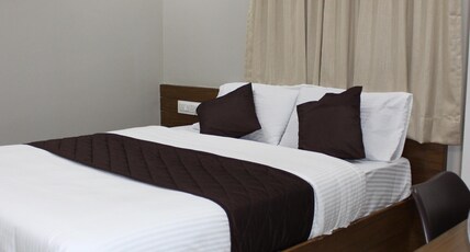Olivia Inn And Suites Room Type - Deluxe  - AC Room
