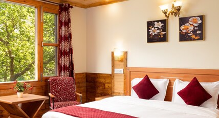 Woodstock Inn ( 800 mtrs from Mall Road ) Room Type - Luxury Double Room with jungle view Woodstock Inn ( 800 mtrs from Mall Road ) Room Type - Luxury Double Room with jungle view