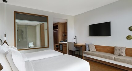 Movenpick Resort Waverly Phu Quoc Room Type - Exclusive Superior Twin Room Garden View with Balcony Movenpick Resort Waverly Phu Quoc Room Type - Exclusive Superior Twin Room Garden View with Balcony