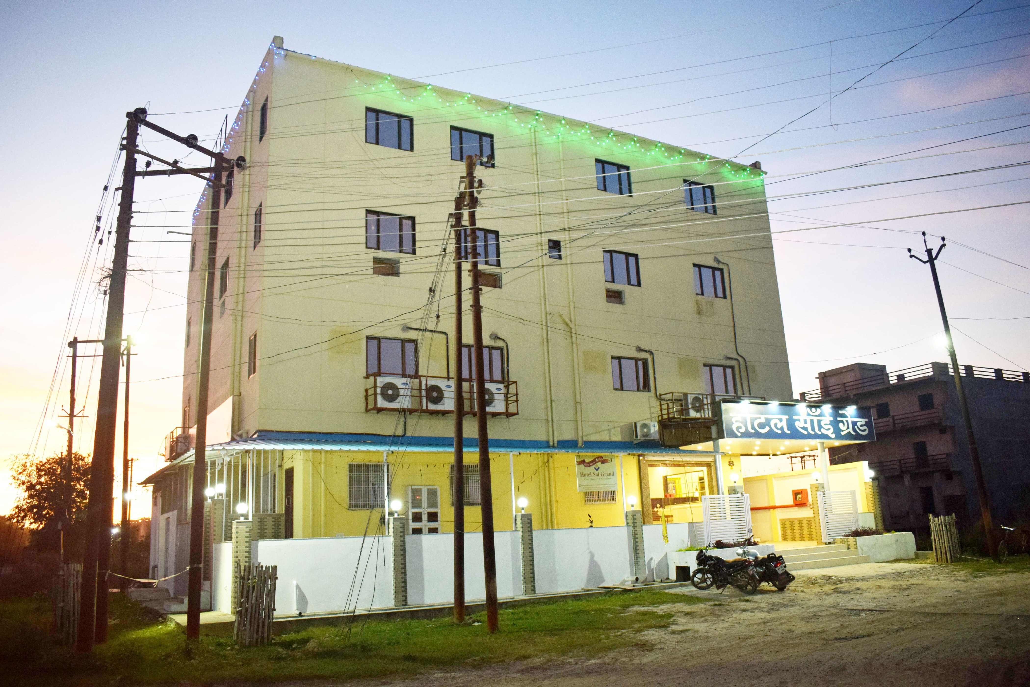Hotel Sai Grand - Tap to explore photos