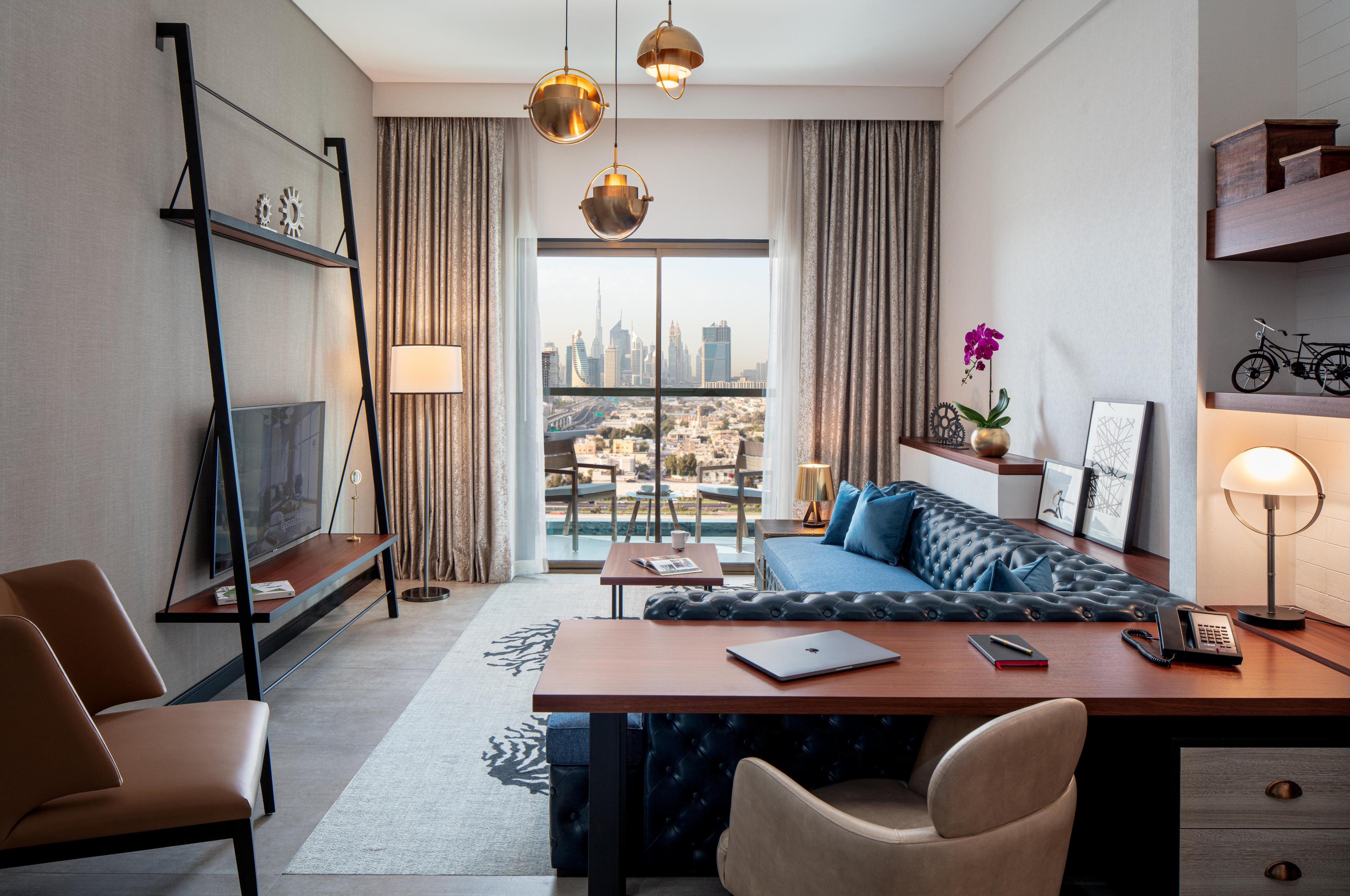 DoubleTree by Hilton Dubai M square Hotel & Residences Room Type - FMLY 1 BDRM APT KIT BLCNY