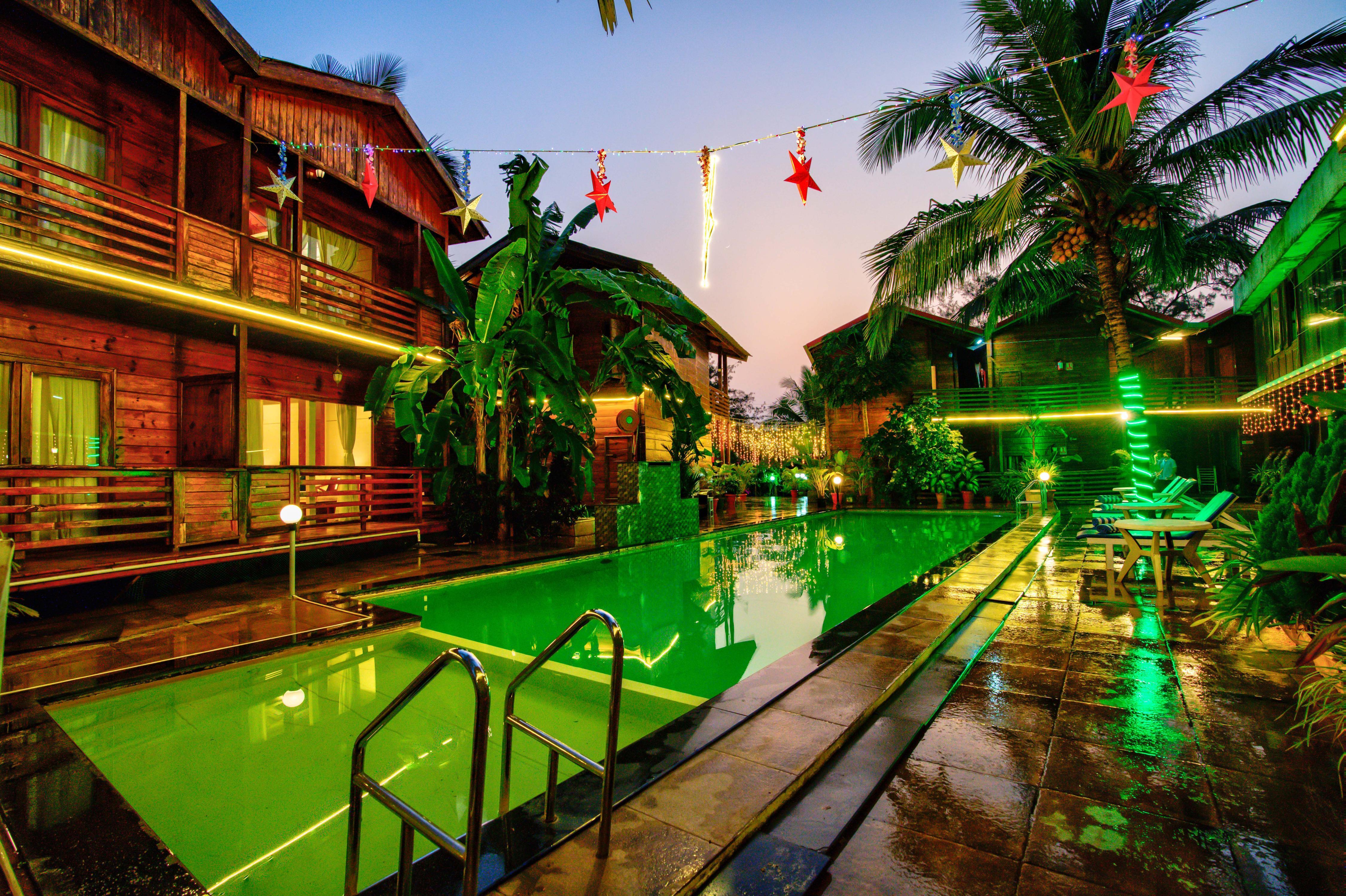 Aqua Marina Beach Cottages | Pool & Cafe - Tap to explore photos