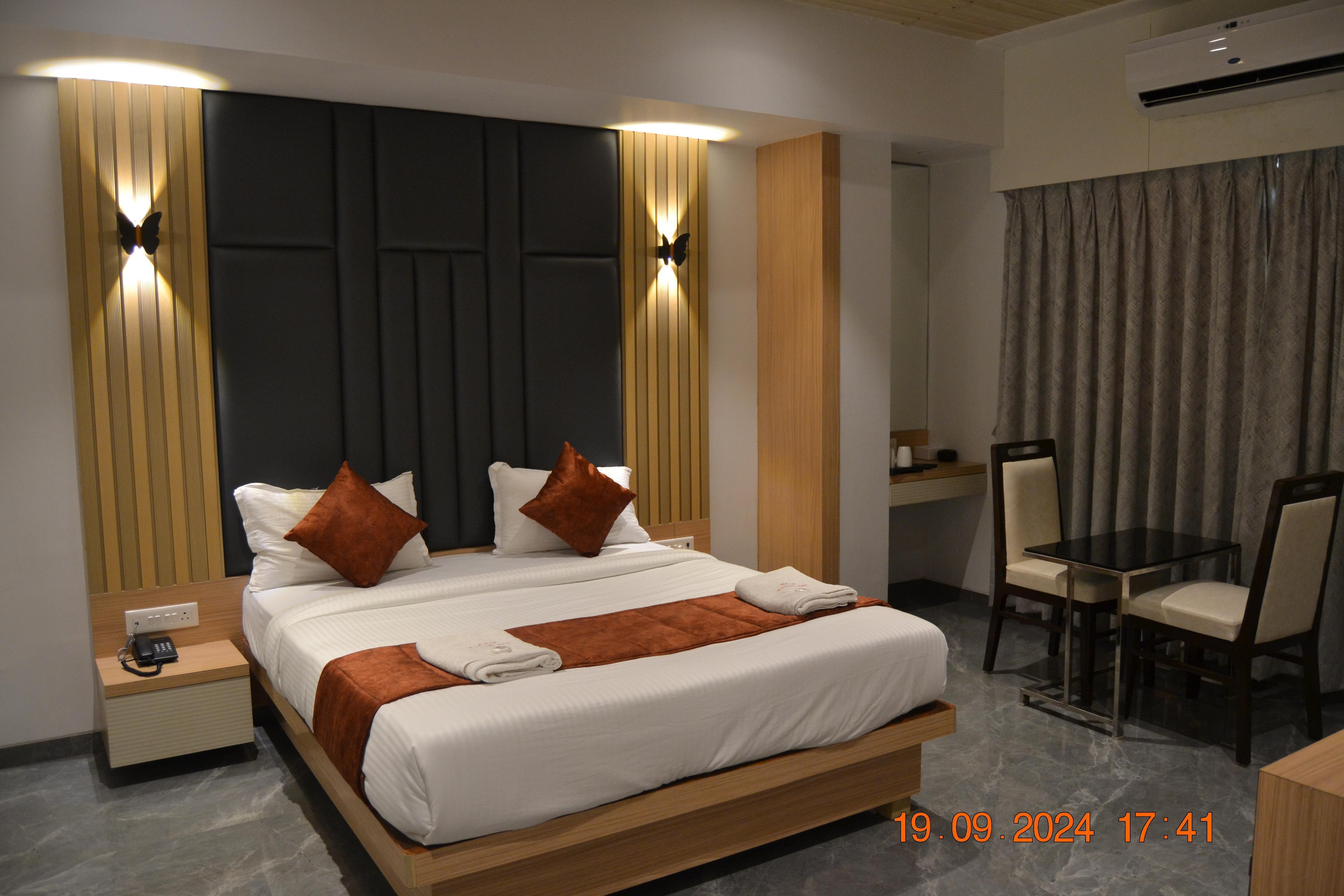 HOTEL AARUSH INN - Tap to explore photos