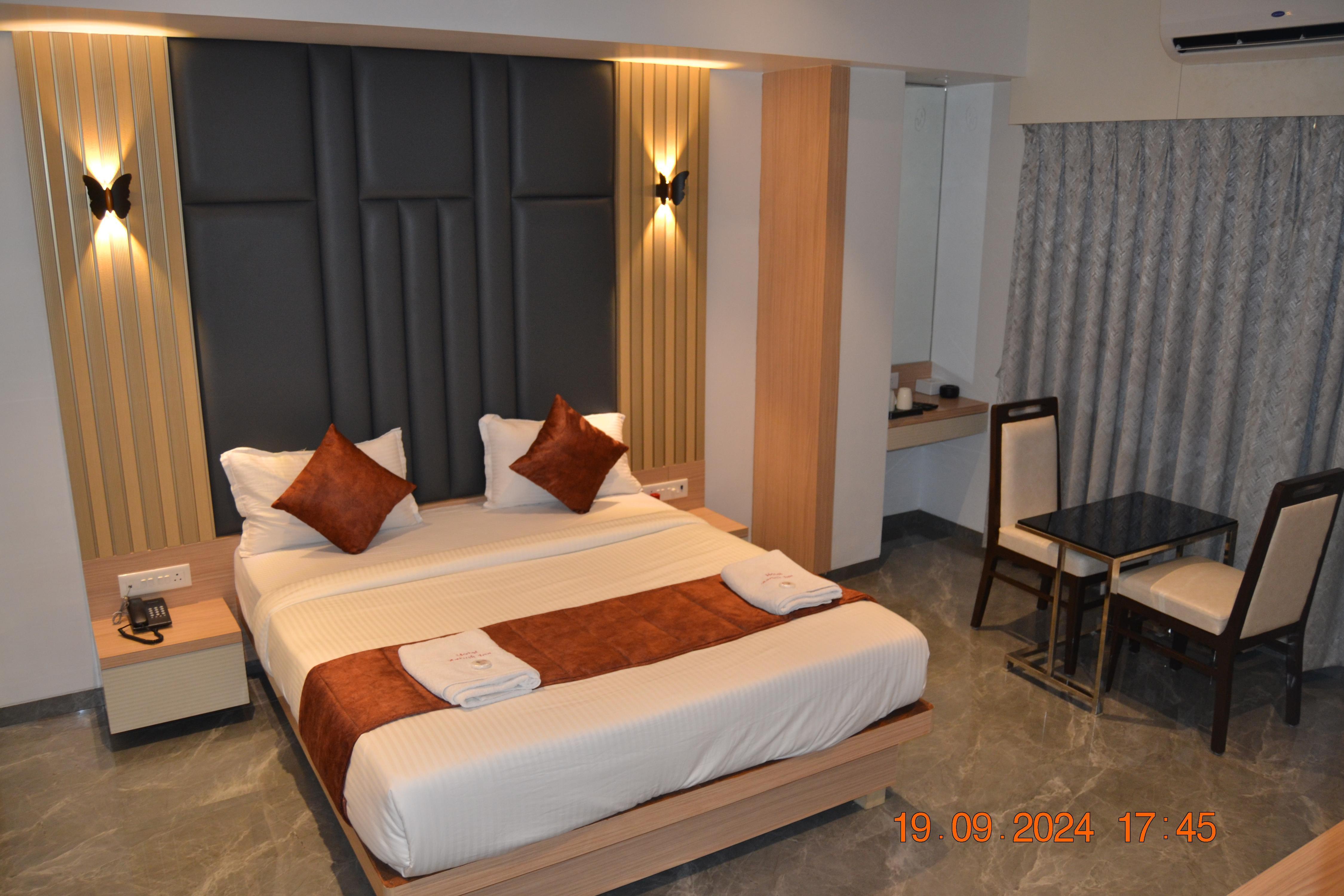 HOTEL AARUSH INN - Tap to explore photos